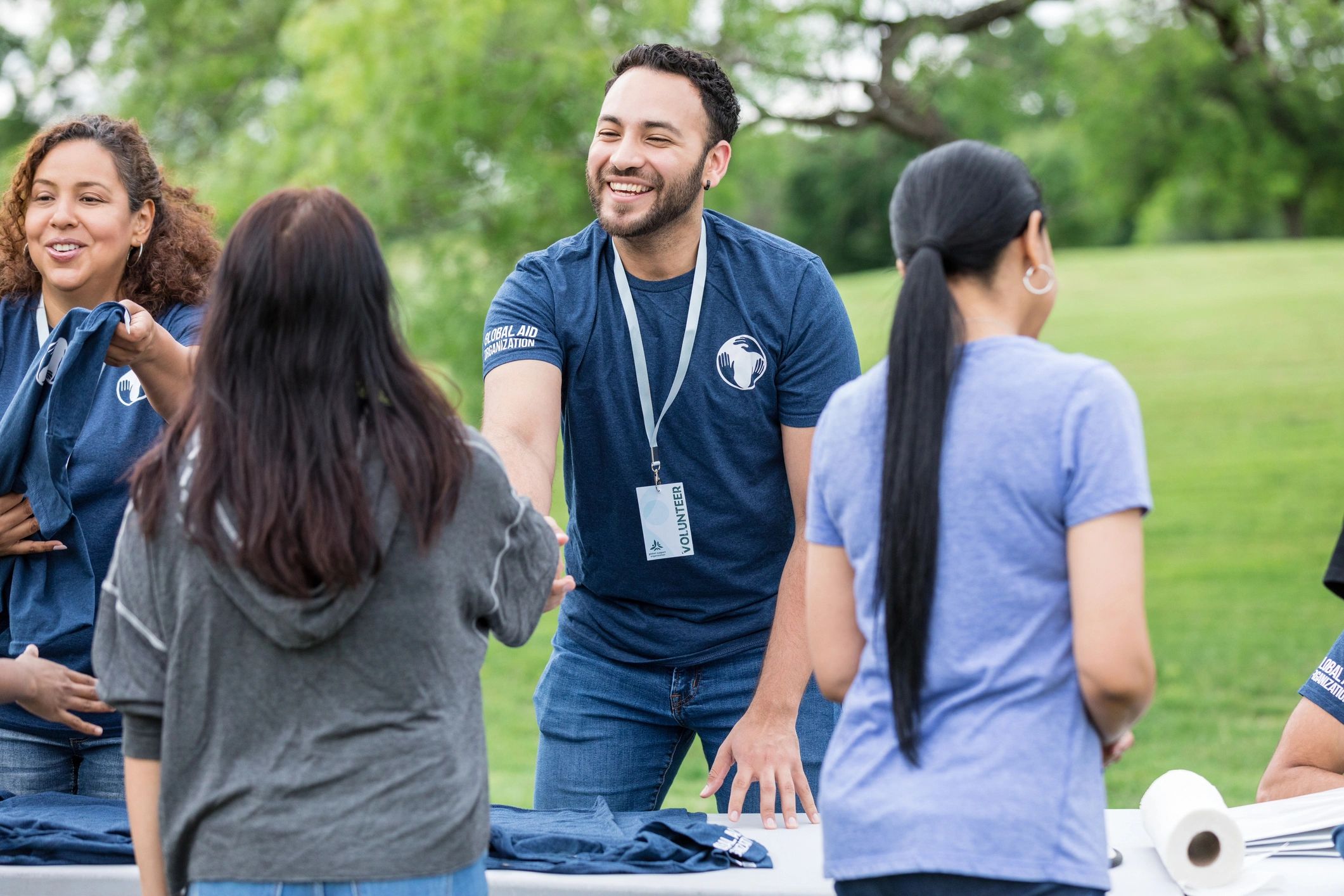 friendly church volunteers greeting